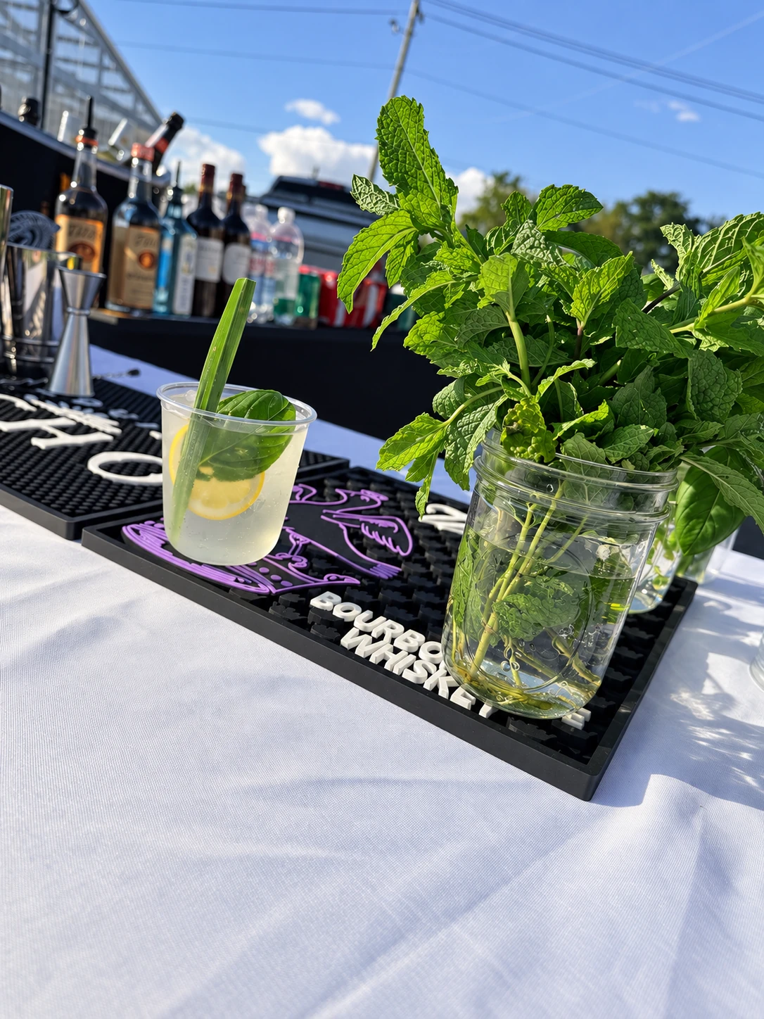 Fresh mint, basil and citrus at an outdoor cocktail bar